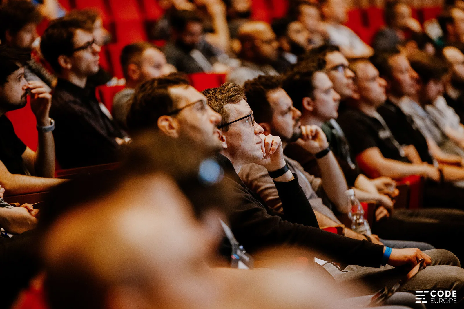An engaged audience at a Code Europe session
